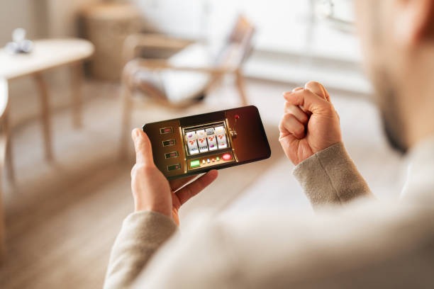 parisbola 1 mobile app interface showing live casino tables on smartphone screen